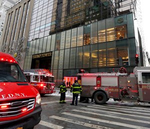 New York City Fire Department vehicles sit on Fifth Avenue in front of Trump Tower.