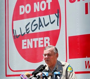 In this Thursday, July 29, 2010 file photo, Maricopa County Sheriff Joe Arpaio speaks in Phoenix announcing his crime suppression sweeps. (AP Photo/Matt York, File)