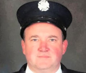 Oswego Fire Department firefighter Sean O'Gorman saved three girls caught in a current off the coast of North Carolina while on vacation Thursday. (Photo/OFD)