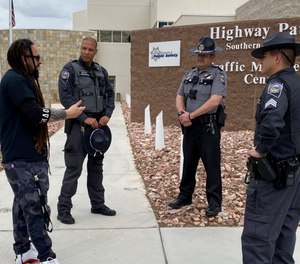 Five Finger Death Punch guitarist Zoltan Bathory (left) visited Nevada Highway Patrol troopers to show support after the death of Trooper Sgt. Ben Jenkins