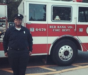Firefighter-EMT Andrew Hughes-Hill, 26, was found stabbed after someone called 911 to report the incident. (Photo/GoFundMe)