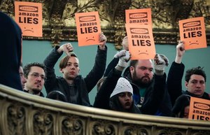 Protestors voice their displeasure during a New York City Council hearing on Amazon’s plan to locate a headquarters in the city. Image: Drew Angerer/Getty Images