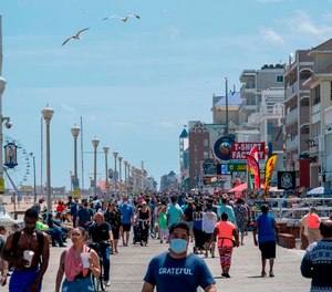 The Ocean City, Maryland, boardwalk filled up quickly in May 2020 after the town dropped many of its COVID-19-related restrictions. The state now has a mask mandate and doesn’t plan to lift it soon.