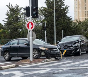 Left-turn restrictions are more effective at busier intersections in the centers of towns or cities than at less busy intersections farther from the town center.