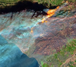 Satellites can quickly detect and monitor wildfires from space, like this 2017 fire that encroached on Ventura, California.