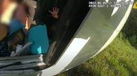 BWC video: Little hand reaching from flipped van leads Fla. deputy to trapped child