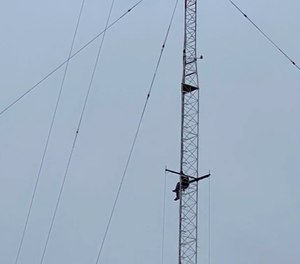 A Pensacola man scaled a 365-foot-tall tower in an attempt to evade police. (Photo/TNS)