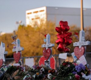 A makeshift memorial is seen outside the Marjory Stoneman Douglas High School, where 17 students and faculty were killed in a mass shooting on Wednesday, in Parkland, Fla., Monday, Feb. 19, 2018.