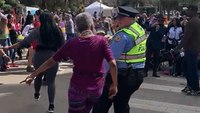 Video: New Orleans cop joins dancers at Mardi Gras