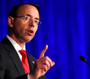 In this June 20, 2017 file photo, Deputy Attorney General Rod Rosenstein speaks in Bethesda, Md.