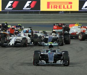 Mercedes driver Nico Rosberg of Germany steers his car as he escapes from an accident behind him during the Bahrain Formula One Grand Prix at the Formula One Bahrain International Circuit, in Sakhir, Bahrain, Sunday, April 3, 2016.