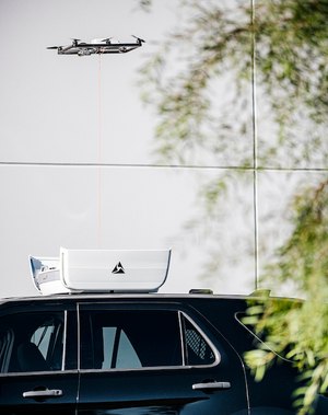 A Fotokite drone is tethered to a public safety vehicle.