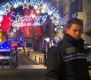 The attack near a French Christmas market left at least 4 people dead and 11 wounded. Police are still searching for the gunman