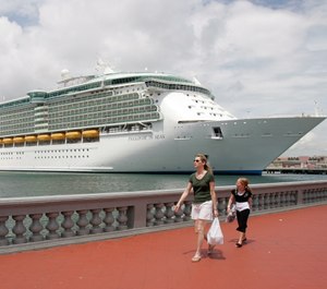 The Freedom of the Seas cruise ship is seen docked at the San Juan Port, Puerto Rico, Wednesday, June 20, 2007. (AP Photo/Andres Leighton)