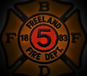 According to arrest papers, an officer saw a group of people separating the Freeland firefighter and Major. (Photo/Freeland Fire Department)