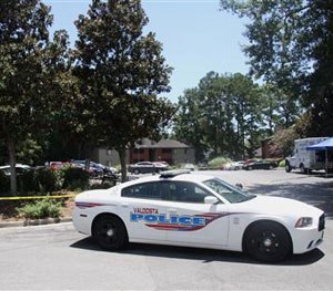 A police vehicle parks near the scene of an officer involved shooting, Friday, July 8, 2016, in Valdosta, Ga. (AP Image)