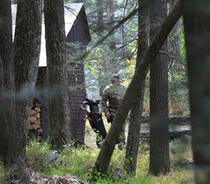 K9 units search for suspect Eric Frein, Wednesday, Sept. 24, 2014 in Canadensis, Pa. Frein, a suspect in the fatal ambush of a trooper has occasionally made himself visible to officers before melting back into the forest, and police found empty packs of Serbian-branded cigarettes and soiled diapers believed to have been left by him, Pennsylvania State Police said Wednesday.