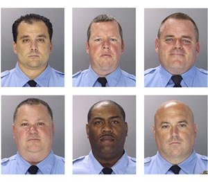 This undated photo combination provided by the Philadelphia Police Department shows from top left to right, Philadelphia Police officers Thomas Liciardello, Brian Reynolds, Michael Spicer, and from bottom left to right, Perry Betts, Linwood Norman and John Speiser. (AP Image)