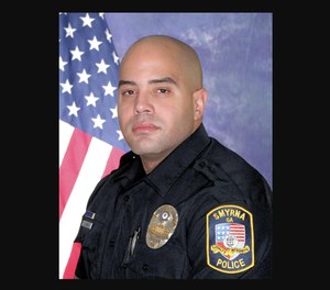 Christopher Ewing was trapped inside until emergency medical personnel were able to extract him. The officer died from his injuries.