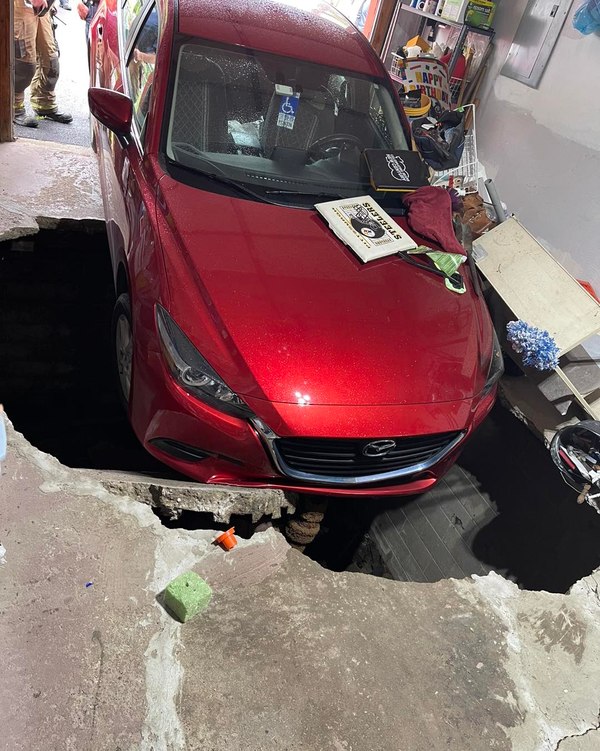 Photos: Pa. garage floor collapses after driver pulls car into it