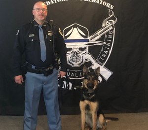 K-9 Willie with his handler, Officer Briggs, in Gary, Indiana. (Photo/Gary Police Department)