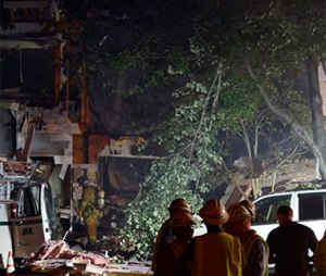 An apparent explosion in Columbia's Clary's Forest neighborhood had fire and rescue officials battling a three-alarm fire Wednesday in Columbia, Md. (Kevin Richardson/The Baltimore Sun via AP)