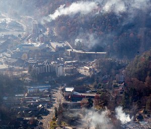 Burned structures are seen from aboard a National Guard helicopter near Gatlinburg, Tenn., Tuesday, Nov. 29, 2016. (AP Photo/Erik Schelzig)