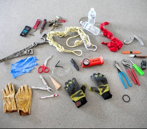 From pliers and screwdrivers to nylon webbing and multi-tools, your average firefighter is ready for anything and everything.