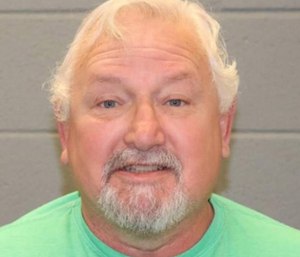 Glenn Halfin will spend a year in prison for tying a noose around the neck of a black baby doll and hanging it from a railing in front of his African-American neighbors' apartment.