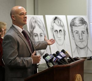 Sgt. Paul Belli gestures toward drawings of a suspected serial killer believed to have committed at least 12 murders across California in the 1970's and 1980's Wednesday, June 15, 2016.