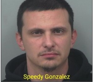 Speedy Gonzalez was charged with forgery, identity theft and theft by deception.(/Photo/Gwinnett Police Department)