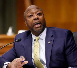 In this May 7, 2020, file photo, Sen. Tim Scott, R-S.C., speaks during a Senate Health Education Labor and Pensions Committee hearing on new coronavirus tests on Capitol Hill in Washington.