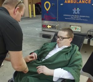 An ambulance transported Evan from the pediatric intensive-care unit at Orlando Health Arnold Palmer Hospital for Children to the Lake Minneola High School graduation ceremony. (Photo/Arnold Palmer Hospital for Children)