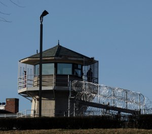 A guard stands in a tower Thursday, March 12, 2009, at the Washington State Penitentiary in Walla Walla, Wash. (AP Photo/Ted S. Warren)