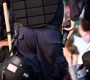 Secure police firearms storage means a beefy locked container bolted to the vehicle’s frame.