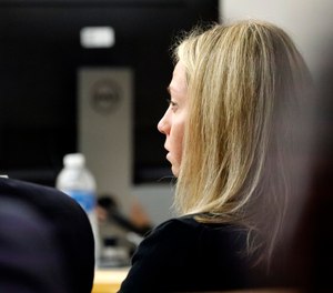 Former Dallas police officer Amber Guyger listens as friends, family and coworkers speak in her defense during the sentencing phase of her murder trial. (Photo/AP)