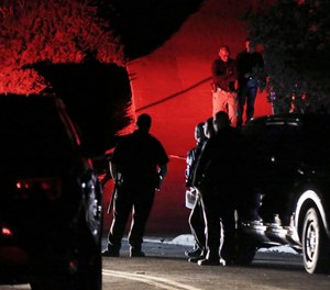 Contra Costa County Sheriff deputies investigate a multiple shooting in Orinda, Calif. that left four dead and four wounded.