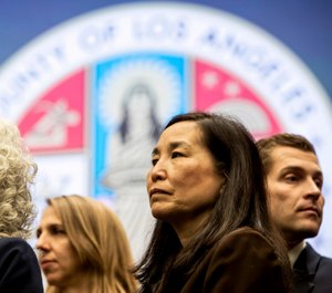 Sachi Hamai, CEO of LA County (center) and Sheriff Alex Villanueva clashed over whether the county should pay officers who dipped into their personal sick leave for COVID-19-related quarantine. (Photo/TNS)