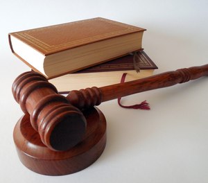 The news media reports that the Supreme Court is considering whether to grant a review of several cases that involve the qualified immunity defense.