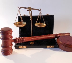 According to the settlement, each defendant is excluded from all federal programs for at least five years. (Photo/Pixabay)