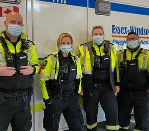 Essex-Windsor EMS paramedics model the harnesses.