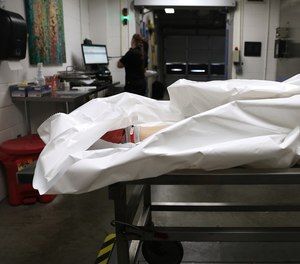 A body is processed at the Pierce County Medical Examiner's office in Tacoma, Washington. (Christina House/ Los Angeles Times/TNS)