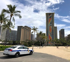 Hawaii law enforcement authorities are cracking down on rogue tourists who are visiting beaches, jetskiing, shopping and generally flouting strict requirements that they quarantine for 14 days after arriving.