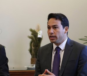 Hawaii state Rep. Chris Lee, chairman of the House Judiciary Committee, wants to examine how the man who fatally shot two Honolulu police officers last week was able to access weapons. (Photo/AP)