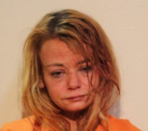 Heather Hissom, 36, is accused of punching an EMS provider and threatening to kill others while being transported for fall injuries. (Photo/Washington County, Pennsylvania)