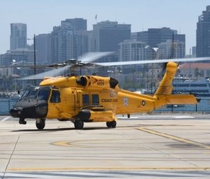 U.S. Coast Guard officials launched a helicopter to investigate a report -- which ultimately turned out to be unfounded -- of about a dozen people struggling in the ocean near the U.S.-Mexico border.