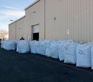 In this undated photo provided by Idaho State Police, authorities believe the leafy, green substance they found in a truck at the U.S. Customs and Border Protection, Boise Port of Entry in Boise, Idaho, is marijuana. A company has filed a lawsuit against Idaho State Police and Ada County after authorities seized nearly 7,000 pounds of cannabis from a truck on Jan. 24, 2019, headed to Colorado, the Idaho Statesman reported. The Idaho State Police has sent a sample of the product to a lab for testing.