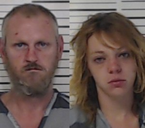 Raymond Jesse Collins Jr., left, 41, and Tatum Michelle Moffett, 24, were arrested in a string of arson fires Wednesday morning, one of which injured a firefighter. (Photo/Henderson County)