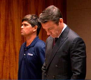 Jacob Maldonado, left, stands with his attorney Jason Burks in court in Honolulu on Wednesday, Feb. 27, 2019. A day earlier, Maldonado was on jury duty when he screamed