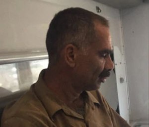 Hussain Maqubool was in the back of an ambulance on Aug. 7 with an EMT when he allegedly started punching the EMT in the chest. (Photo/NYPD)